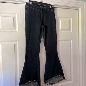 Cute bell jeggings! Elastic waist and stretch denim. Sz 4
